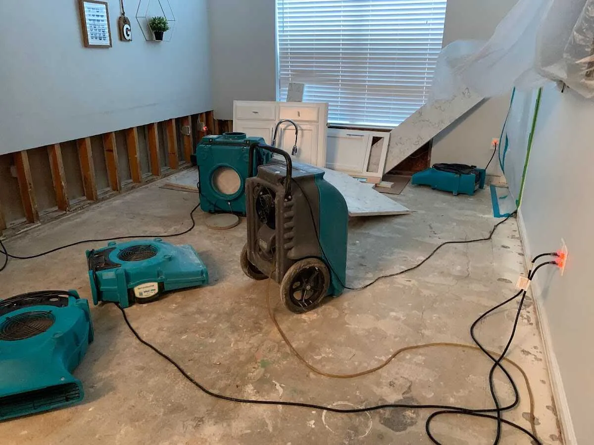 Dehumidifier in flood-cut room for Water Damage Restoration in Little Ferry